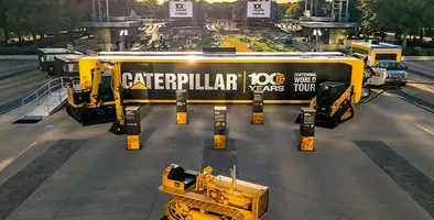 The celebrations of Caterpillar with banners and equipment on display.
