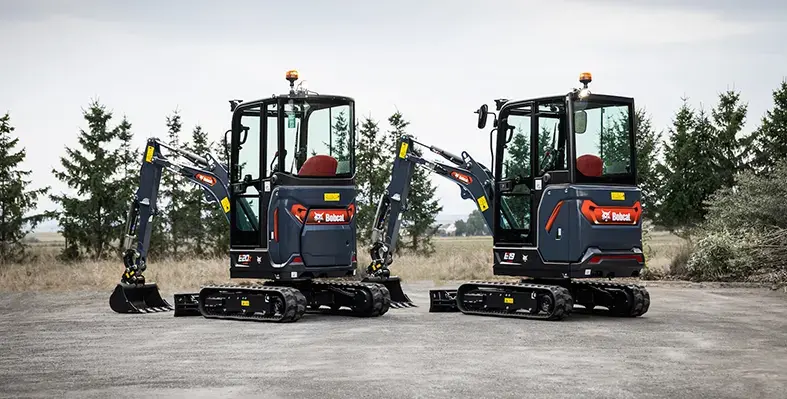 two_Bobcat_mini_excavators_outdoors