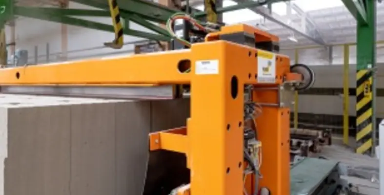 The custom-made green cake separating machine (GSM) was used to separate all the AAC blocks/panels before autoclaving in order to prevent their sticking to each other. (Image source: WKB Systems GmbH) green cake separating2